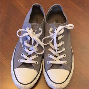 Gray Converse with a switchable patterned tongue.